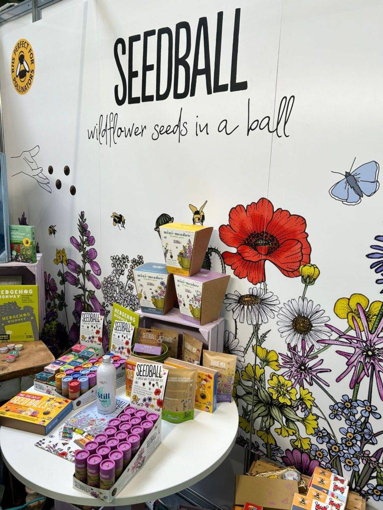 Seedball exhibitor stand at Glee 2024 showcasing a variety of seed ball products